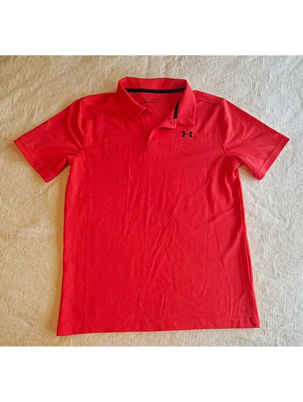 Under Armour Boys size YXL Solid Logo Polo Shirt Short Sleeve Loose Fit Pullover